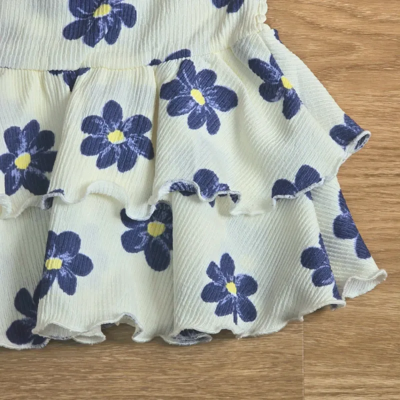 Saya de vuelos con flores azules