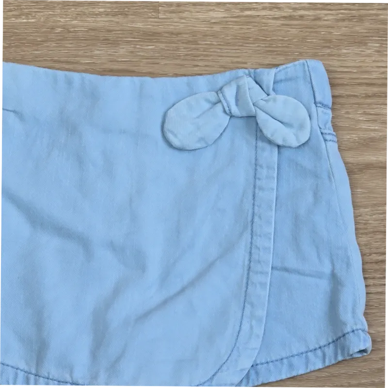 Saya short estilo mezclilla con lazo lateral