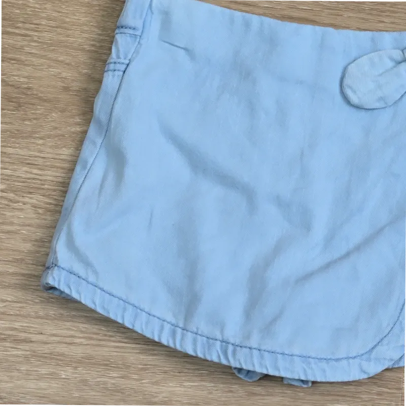 Saya short estilo mezclilla con lazo lateral