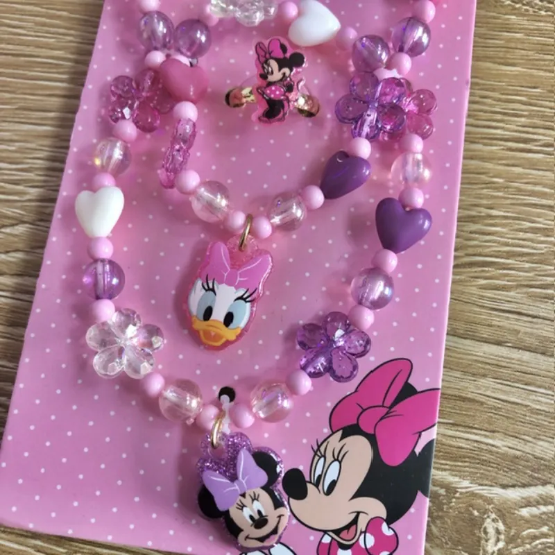 Set de anillo, pulso y collar de Minnie y Daysi
