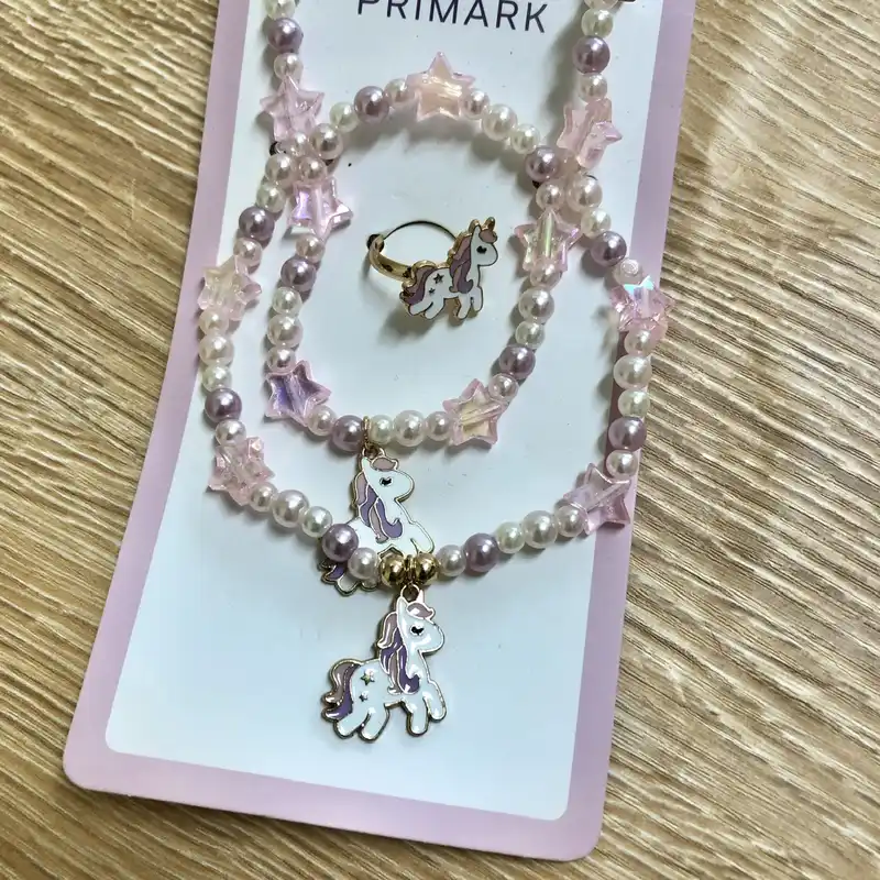 Set de collar, pulsera y anillo con unicornio 