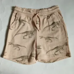 Short color beige con dinosaurios