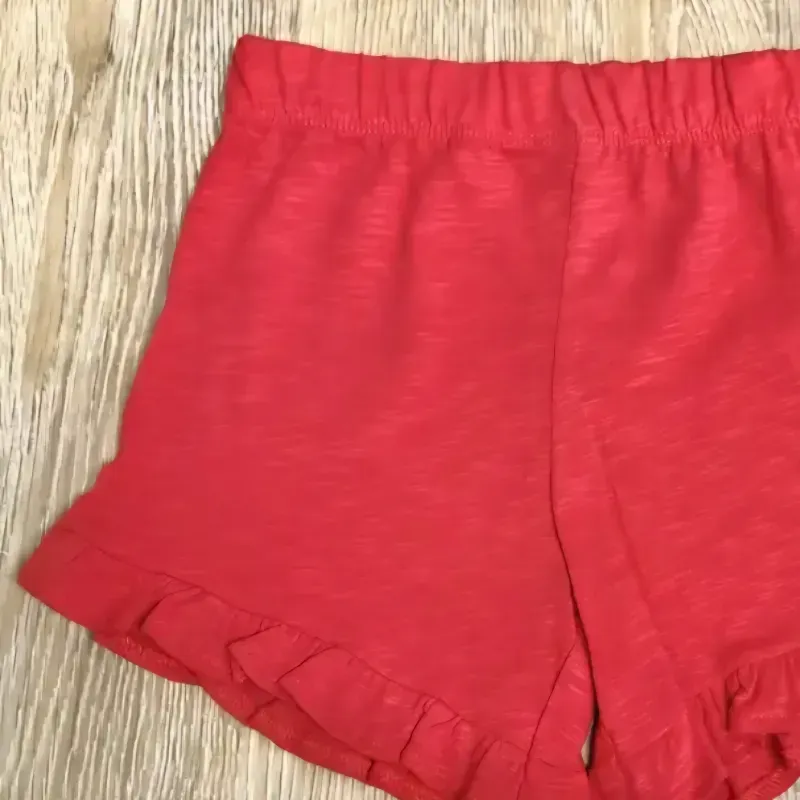 Short color rojo