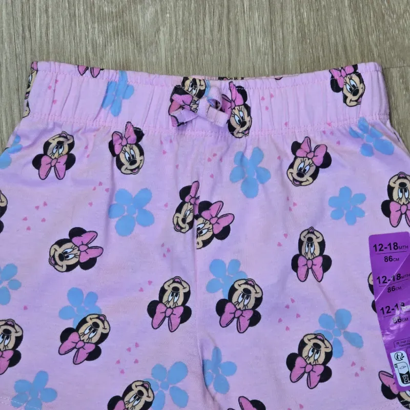 Short color rosado de Minnie con flores