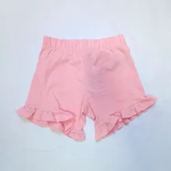 Short color salmón con vuelos 