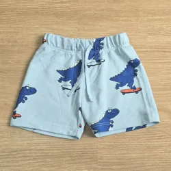Short de felpa azul con Dinosaurios