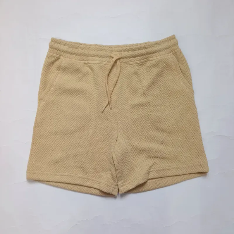 Short de felpa color beige 