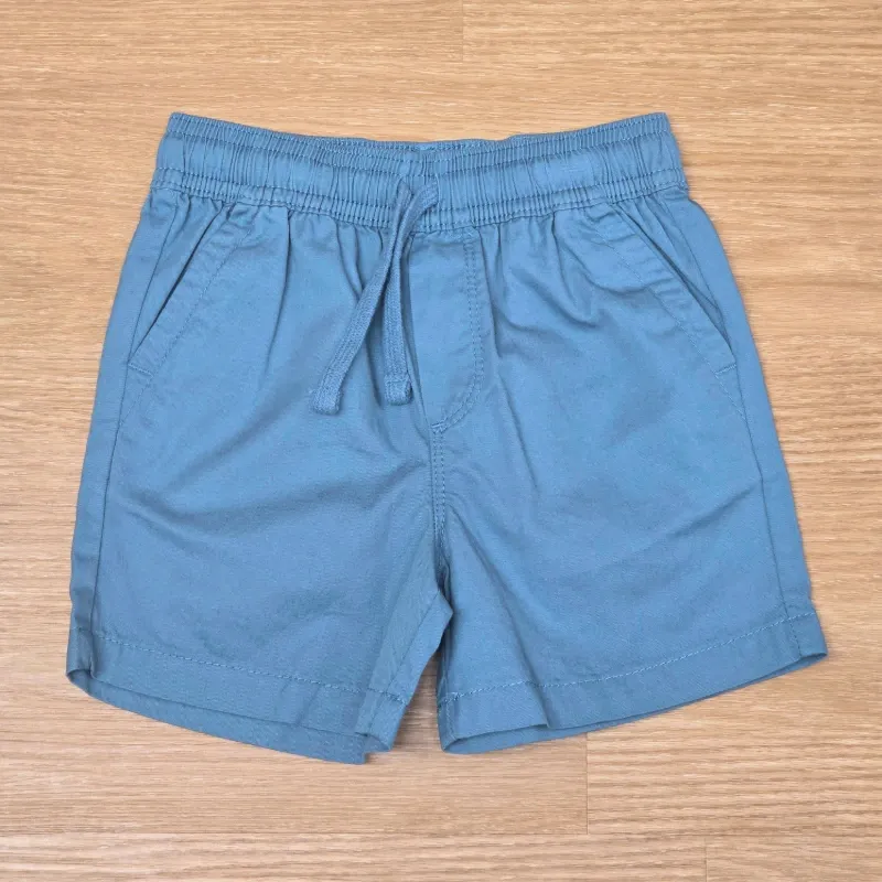 Short de tela color Verde
