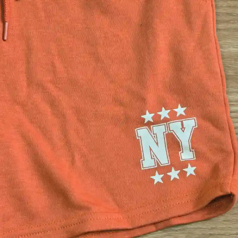 Short naranja de felpa New York