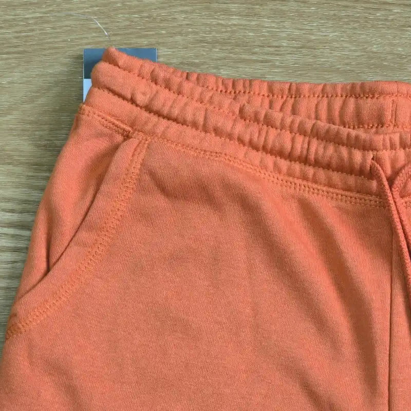 Short naranja de felpa New York