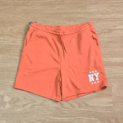 Short naranja de felpa New York