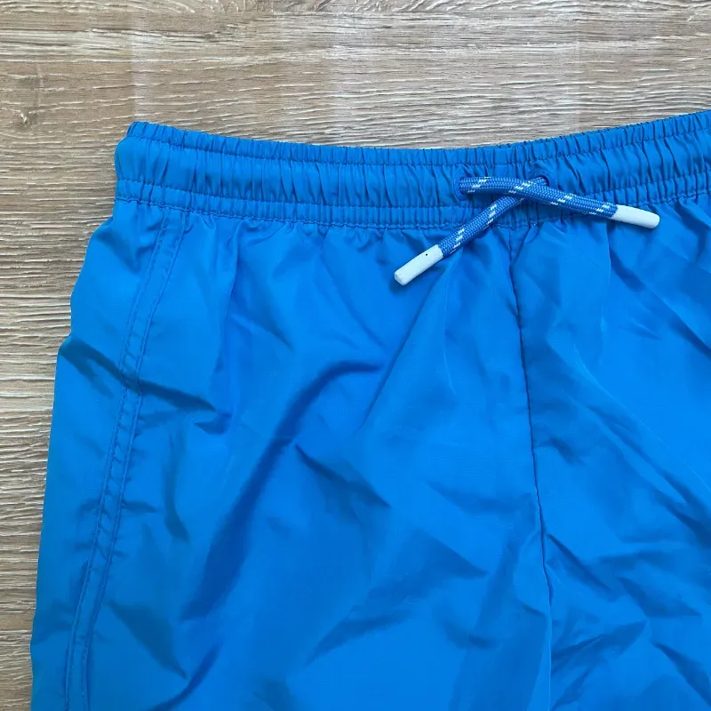 Short playero color azul
