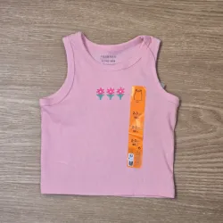 Top color rosa con flores