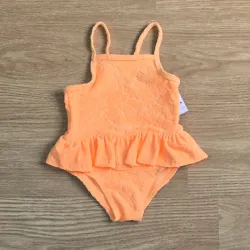 Traje de baño color naranja de flores