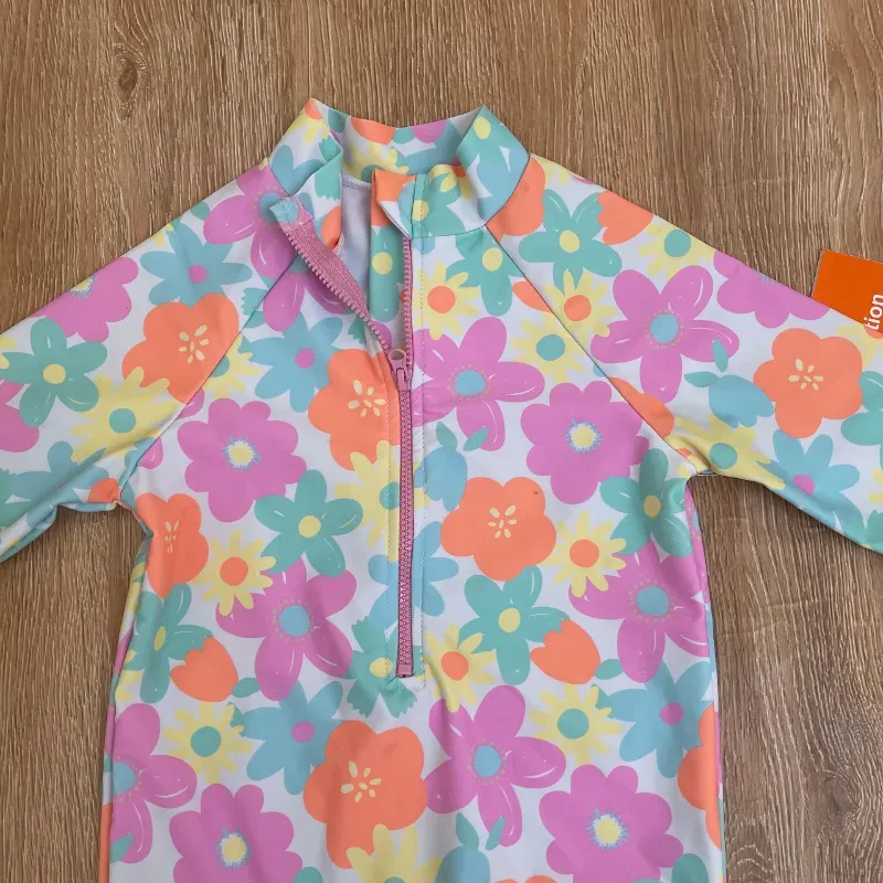 Traje de baño de flores con mangas largas 