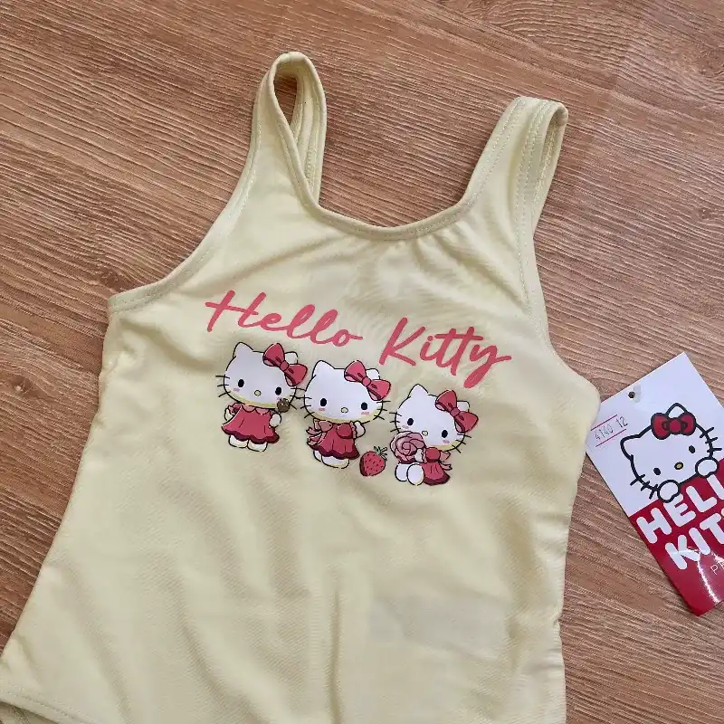 Trusa "Hello Kitty" de color amarillo 