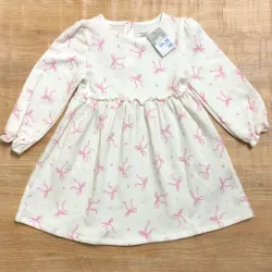 Vestido blanco con lazos rosados 