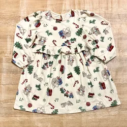 Vestido color crema con motivos navideños 