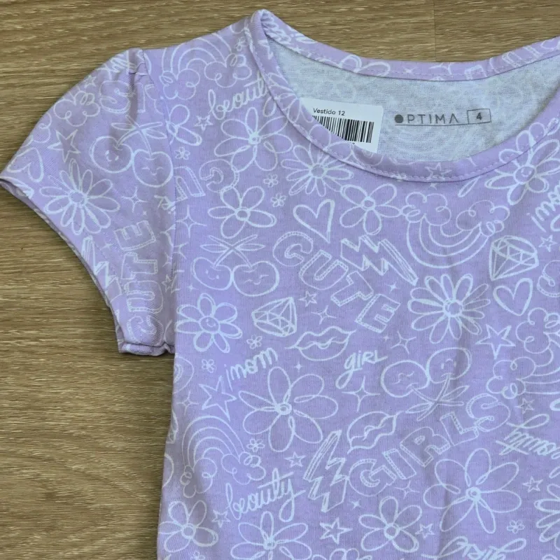Vestido color violeta con figuras variadas