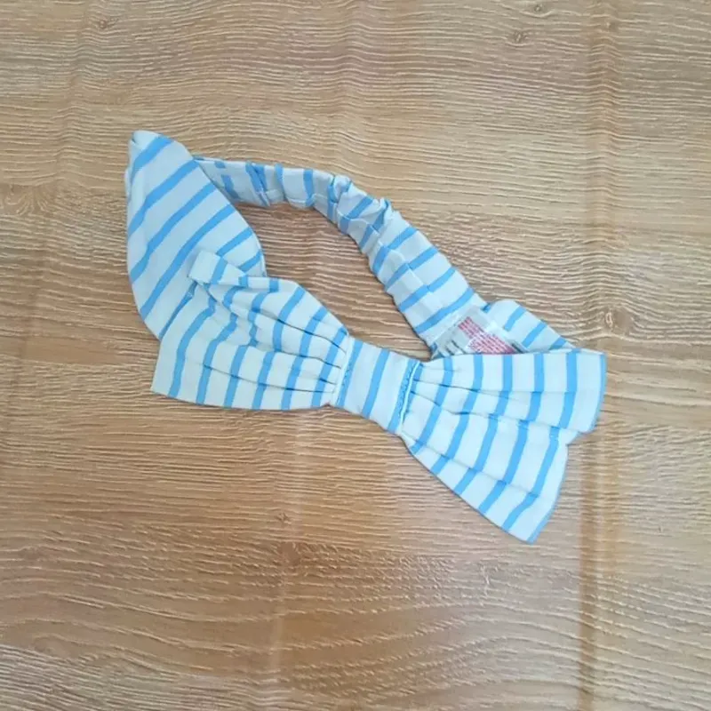 Vestido de rayas con lazo y bolsillos 