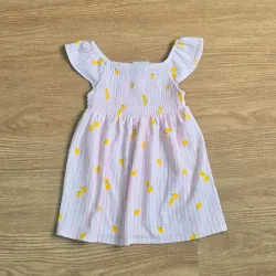 Vestido de rayas rosadas con limones