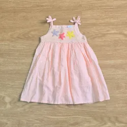 Vestido rosado con estrellas de mar