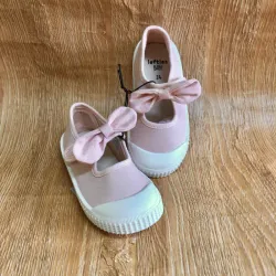 Zapatos con lazo color rosado