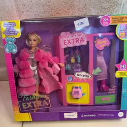 Barbie con accesorios de ropa