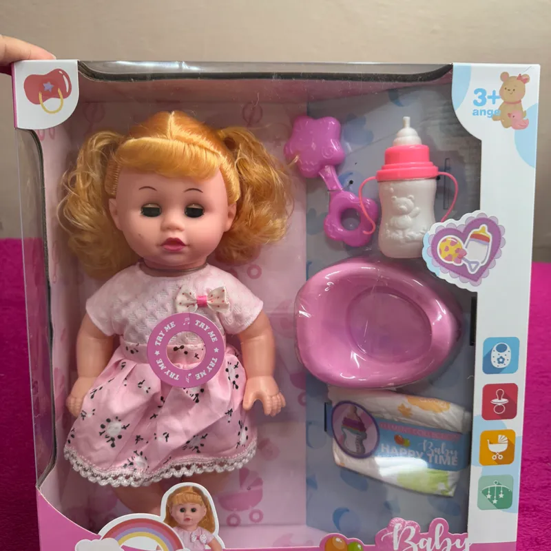 Muñeca con accesorios de cuidado 