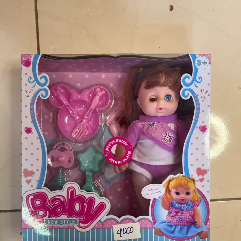 Muñeca con accesosorios de bebe