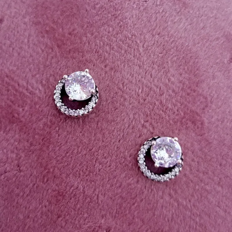 Aretes de botón con halo redondo brillante