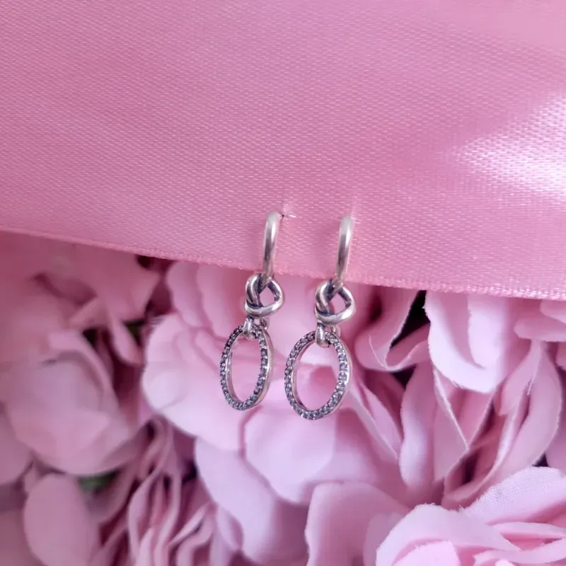 Aretes Corazones anudados de Plata y Circonitas