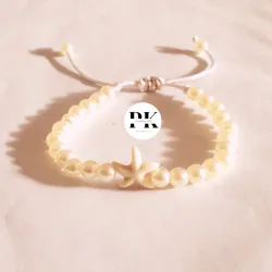 PULSERA DE PERLAS 6MM CON ESTRELLA DE TURQUESA