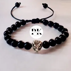 PULSERA DE PERLAS NEGRAS CON CONECTOR DE LEÓN