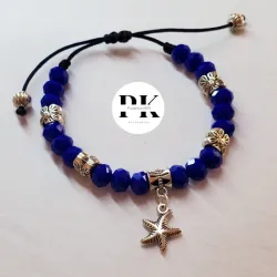 PULSERA DE SWAROVSKI AZUL CON DIJE DE ESTRELLA DE MAR