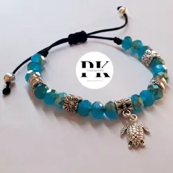 PULSERA DE SWAROVSKI AZUL CON DIJE DE TORTUGA