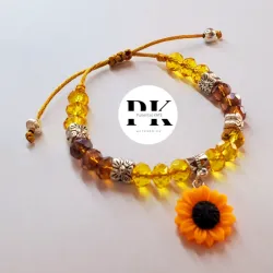 PULSERA DE SWAROVSKI CON DIJE DE GIRASOL
