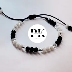 PULSERA DE SWAROVSKI NEGRO, BLANCO Y TRANSPARENTE