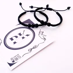 PULSERA TEJIDA CON DETALLES DE ONIX
