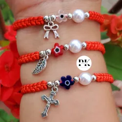 PULSERA TEJIDA CON DIJE, OJO TURCO DE FLOR Y PERLA