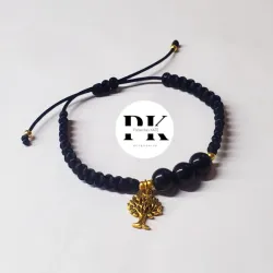 PULSERA TEJIDA CON ONIX Y DIJE