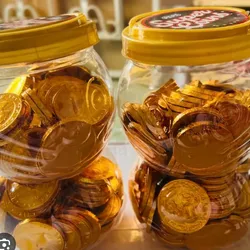 Pomo con monedas de chocolate