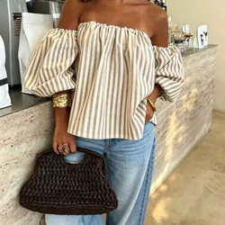 Blusa de hombros descubiertos con mangas de bombillo