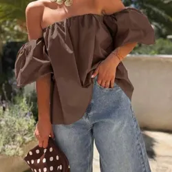 Blusa de hombros descubiertos con mangas de bombillo