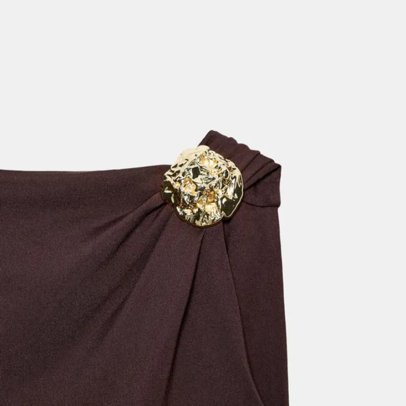 Body Zara con detalle dorado y escote detrás