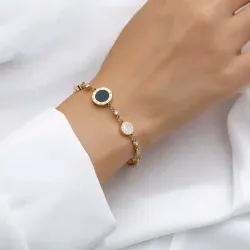 Manilla con circonias y círculos blanco y negro