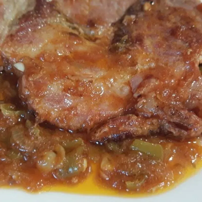 lomos cocido en salsa Caribe