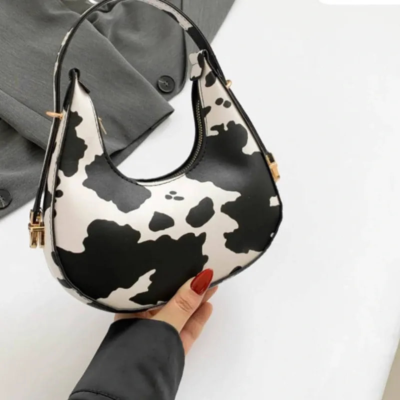 Cartera blanca y negra
