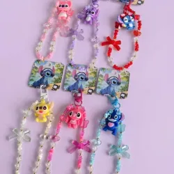 Colgante de Stitch y Ángel💖