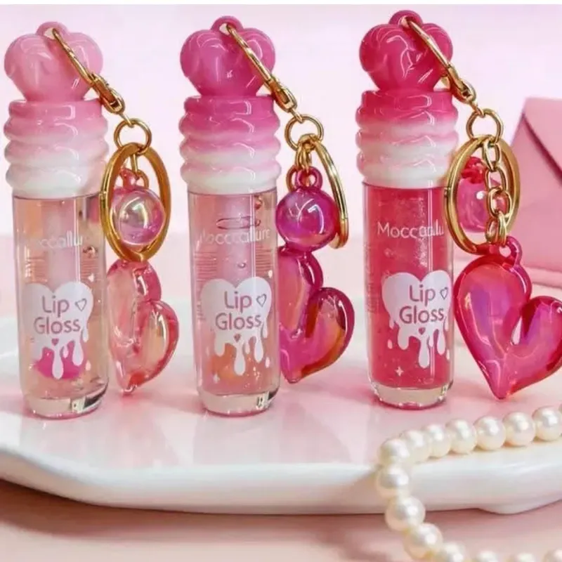 Lip gloss mágico con llavero 💗 ✨🔖